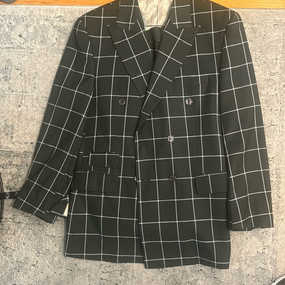 This is a 2 piece men suit in a size 38R/32R.